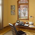 small home office with an open archtop window