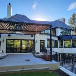 home exterior with several glass windows