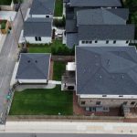 view from the top of several houses with similar roof type
