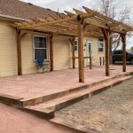 pergola attached to the back of the house