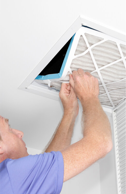 man-removing-dirty-air-filter-mature-man-taking-out-dirty