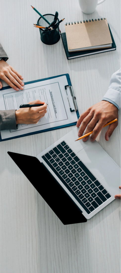 img - patient-signing-insurance-claim-form-clinic-doctor