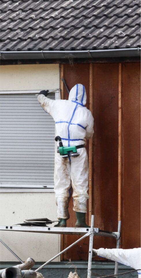 professionals-protective-suits-remove-asbestos-wall