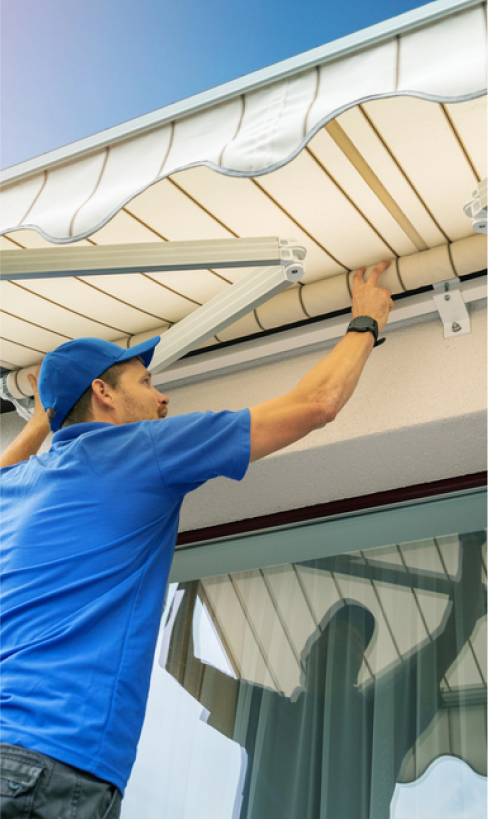 img - worker-install-awning-house-wall-terrace-window