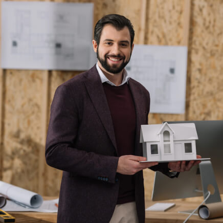 img - young-architect-paper-house-model-office