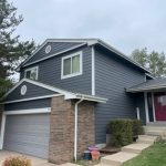 Front of a home with new windows and siding