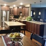 Kitchen features timeless cherry wood cabinets