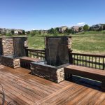 Outdoor living space featuring a wooden deck