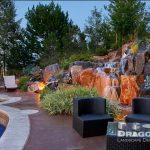 stone poolscape with waterfall feature