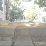 industrial level on top of a concrete with crack