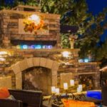 outdoor lounge area with fireplace