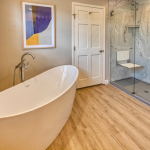 bathroom with tub and walk-in shower